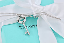 Load image into Gallery viewer, Tiffany &amp; Co. Atlas 18K White Gold 4 Diamond Circle Key Pendant Necklace
