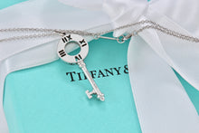 Load image into Gallery viewer, Tiffany &amp; Co. Atlas 18K White Gold 4 Diamond Circle Key Pendant Necklace
