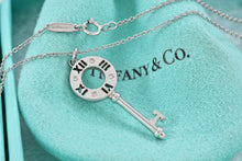 Load image into Gallery viewer, Tiffany &amp; Co. Atlas 18K White Gold 4 Diamond Circle Key Pendant Necklace
