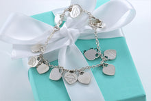 Load image into Gallery viewer, Return To Tiffany &amp; Co. Silver Multi Mini Heart Charms Bracelet
