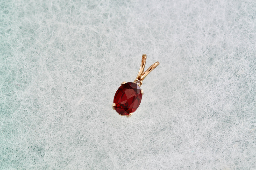 10Kt. Yellow Gold Red Garnet Oval Diamond Pendant