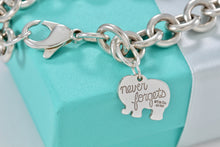 Load image into Gallery viewer, Tiffany &amp; Co. Nature Silver Elephant Never Forgets Charm Bracelet
