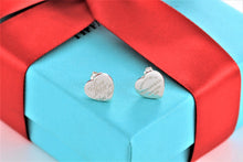 Load image into Gallery viewer, Return To Tiffany &amp; Co. Notes Silver Mismatch Heart Stud Earrings
