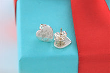 Load image into Gallery viewer, Return To Tiffany &amp; Co. Notes Silver Mismatch Heart Stud Earrings
