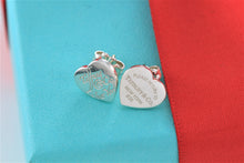 Load image into Gallery viewer, Return To Tiffany &amp; Co. Notes Silver Mismatch Heart Stud Earrings
