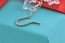 Load image into Gallery viewer, Tiffany &amp; Co. Elsa Peretti Silver Crystal Dangle Star Earrings
