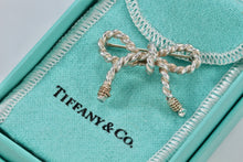 Load image into Gallery viewer, Tiffany &amp; Co. Gold &amp; Silver Twist Rope Bow Ribbon Coil Brooch
