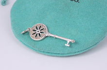 Load image into Gallery viewer, Tiffany &amp; Co. Silver Daisy Flower Small Diamond Key 1.5&quot; Pendant
