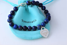 Load image into Gallery viewer, Return To Tiffany &amp; Co. Silver Heart Charm 8mm Blue Lapis Beaded Bracelet
