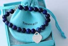 Load image into Gallery viewer, Return To Tiffany &amp; Co. Silver Heart Charm 8mm Blue Lapis Beaded Bracelet
