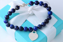 Load image into Gallery viewer, Return To Tiffany &amp; Co. Silver Heart Charm 8mm Blue Lapis Beaded Bracelet
