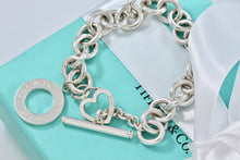 Load image into Gallery viewer, Tiffany &amp; Co. Silver Heart Cutout Charm Dual Toggle Bracelet
