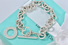 Load image into Gallery viewer, Tiffany &amp; Co. Silver Heart Cutout Charm Dual Toggle Bracelet
