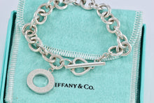 Load image into Gallery viewer, Tiffany &amp; Co. Silver Heart Cutout Charm Dual Toggle Bracelet
