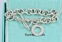 Load image into Gallery viewer, Tiffany &amp; Co. Silver Heart Cutout Charm Dual Toggle Bracelet
