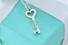 Load image into Gallery viewer, Tiffany &amp; Co. Silver Small Heart Key 1&quot; Pendant Necklace
