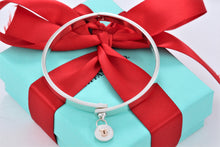 Load image into Gallery viewer, Tiffany &amp; Co. 18K Gold &amp; Silver Round Keyhole Lock Hinged Bangle Bracelet
