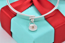 Load image into Gallery viewer, Tiffany &amp; Co. 18K Gold &amp; Silver Round Keyhole Lock Hinged Bangle Bracelet
