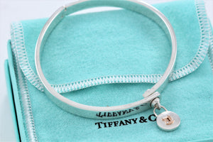 Tiffany & Co. 18K Gold & Silver Round Keyhole Lock Hinged Bangle Bracelet