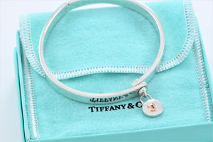 Tiffany & Co. 18K Gold & Silver Round Keyhole Lock Hinged Bangle Bracelet