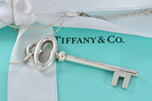 Load image into Gallery viewer, Tiffany &amp; Co. Silver Skeleton Oval Key Pendant Necklace
