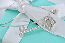 Load image into Gallery viewer, Tiffany &amp; Co. Silver Skeleton Oval Key Pendant Necklace
