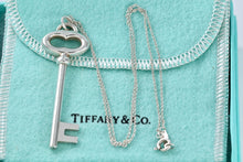 Load image into Gallery viewer, Tiffany &amp; Co. Silver Skeleton Oval Key Pendant Necklace
