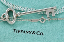 Load image into Gallery viewer, Tiffany &amp; Co. Silver Skeleton Oval Key Pendant Necklace
