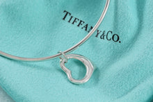 Load image into Gallery viewer, Tiffany &amp; Co. Elsa Peretti Silver Small Dangle Open Heart Bangle
