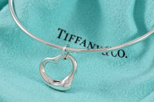 Load image into Gallery viewer, Tiffany &amp; Co. Elsa Peretti Silver Small Dangle Open Heart Bangle
