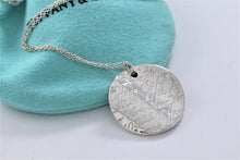 Load image into Gallery viewer, Tiffany &amp; Co. Silver Notes Round Wavy Circle Pendant Necklace
