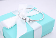 Load image into Gallery viewer, Tiffany &amp; Co. 18K White Gold Diamond T Wire Bangle Bracelet
