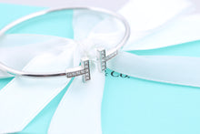 Load image into Gallery viewer, Tiffany &amp; Co. 18K White Gold Diamond T Wire Bangle Bracelet
