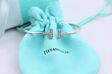 Load image into Gallery viewer, Tiffany &amp; Co. 18K White Gold Diamond T Wire Bangle Bracelet
