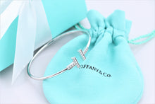 Load image into Gallery viewer, Tiffany &amp; Co. 18K White Gold Diamond T Wire Bangle Bracelet
