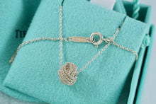 Load image into Gallery viewer, Tiffany &amp; Co. Mesh Silver Twist Knot Pendant Necklace
