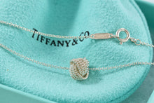 Load image into Gallery viewer, Tiffany &amp; Co. Mesh Silver Twist Knot Pendant Necklace
