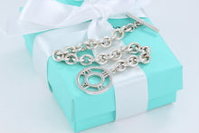 Load image into Gallery viewer, Tiffany &amp; Co. Silver Atlas Round Medallion Toggle Bracelet
