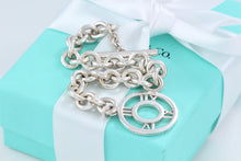Load image into Gallery viewer, Tiffany &amp; Co. Silver Atlas Round Medallion Toggle Bracelet
