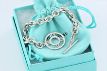 Load image into Gallery viewer, Tiffany &amp; Co. Silver Atlas Round Medallion Toggle Bracelet
