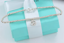 Load image into Gallery viewer, Tiffany &amp; Co. Silver Peace Charm Mini Beaded Bracelet
