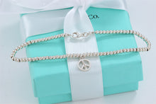 Load image into Gallery viewer, Tiffany &amp; Co. Silver Peace Charm Mini Beaded Bracelet

