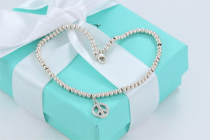 Tiffany & Co. Silver Peace Charm Mini Beaded Bracelet