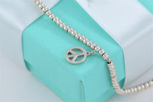 Load image into Gallery viewer, Tiffany &amp; Co. Silver Peace Charm Mini Beaded Bracelet
