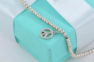 Tiffany & Co. Silver Peace Charm Mini Beaded Bracelet
