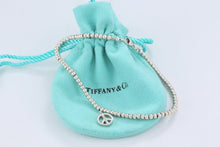 Load image into Gallery viewer, Tiffany &amp; Co. Silver Peace Charm Mini Beaded Bracelet
