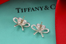 Load image into Gallery viewer, Tiffany &amp; Co. Silver Ribbon Bow Stud Earrings
