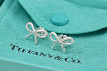 Load image into Gallery viewer, Tiffany &amp; Co. Silver Ribbon Bow Stud Earrings
