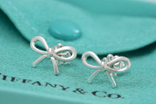 Load image into Gallery viewer, Tiffany &amp; Co. Silver Ribbon Bow Stud Earrings
