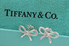 Load image into Gallery viewer, Tiffany &amp; Co. Silver Ribbon Bow Stud Earrings
